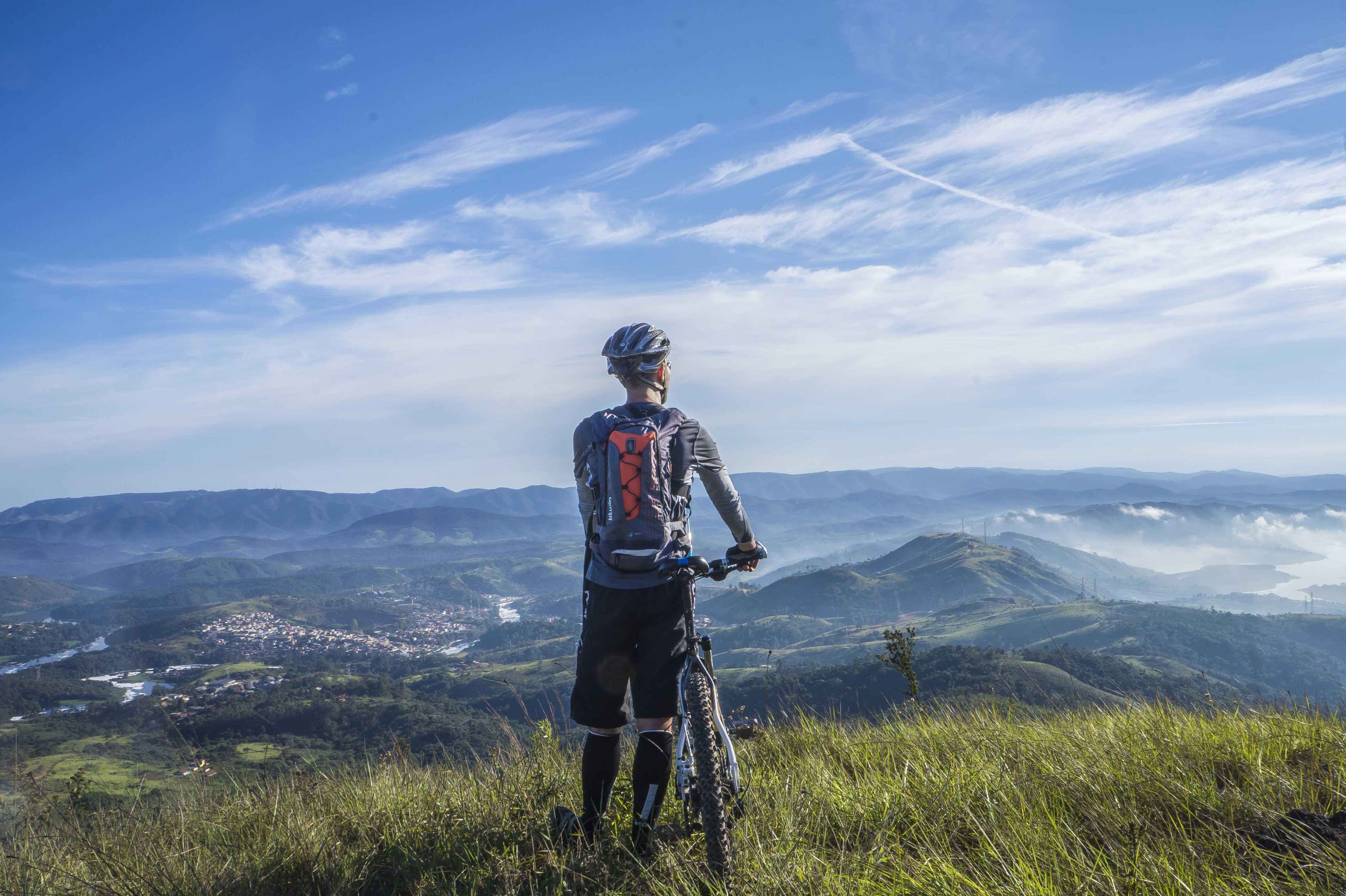 Men with Cycle on Mountains