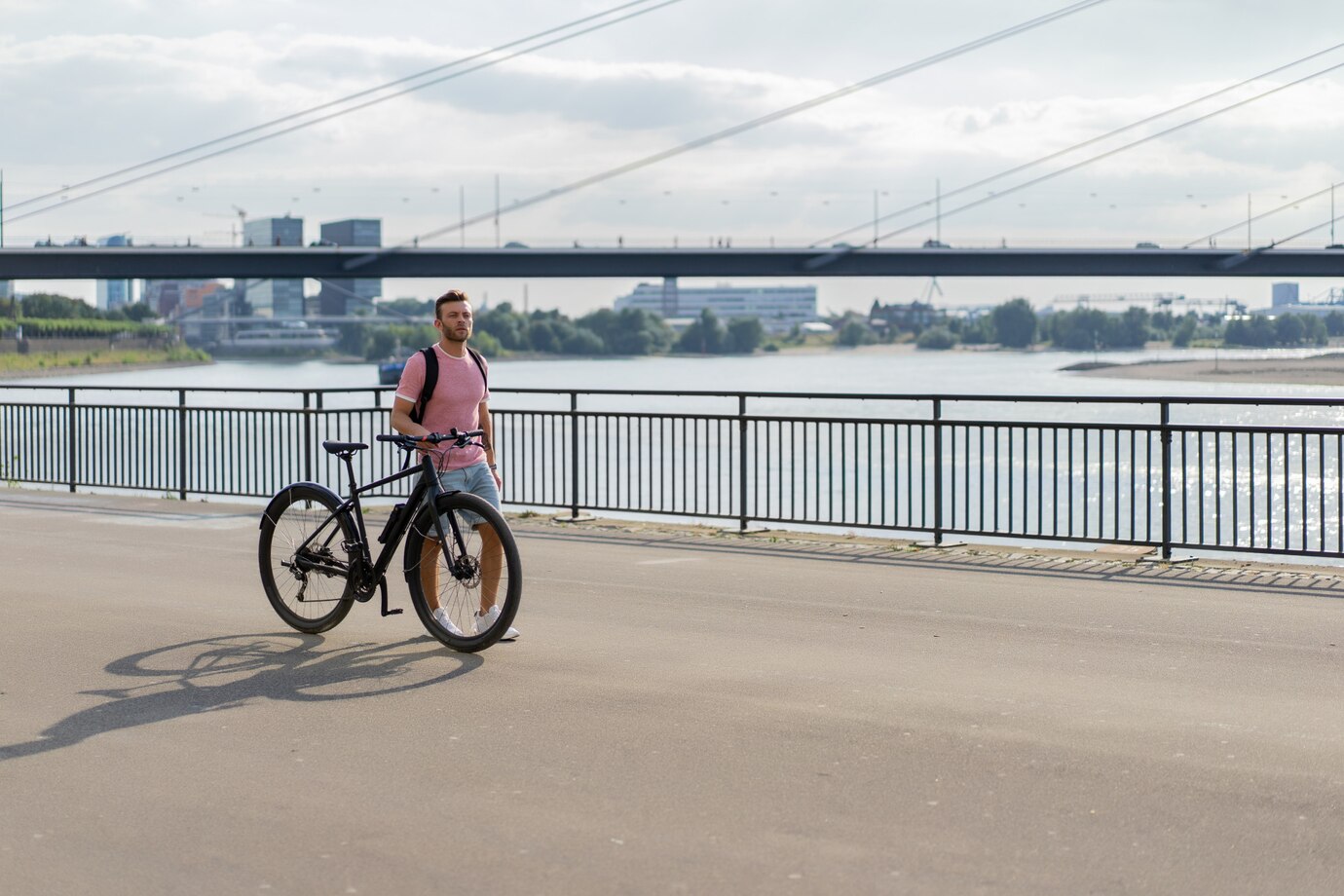 Young Men with Bicycle